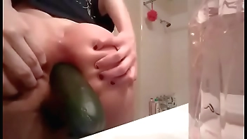 Young blonde gf fists herself and puts a cucumber in ass