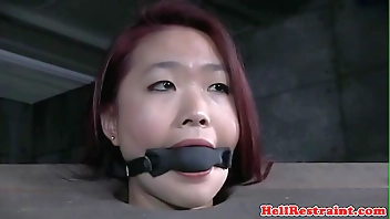 Redhead asian sub with mouth gag dominated