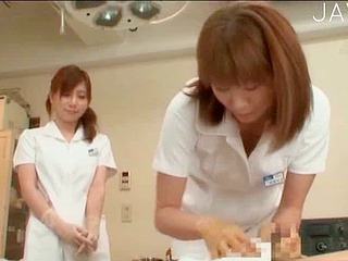 Serving up a steamy XXX scene, nippon beauty with busty tatas moans wildly as hairy twat is savagely licked.