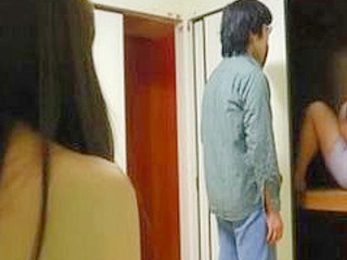 Ebony tantalizes with her nipple clamps in Tokyo hotel room.