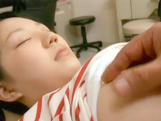 Dentist's ecstatic climax on unconscious teen's creamy pussy under anesthesia in Tokyo.